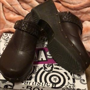 Brown clogs